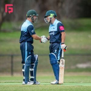 SECA senior team skipper Darian Kuzma congratulates Tim Scott after he bought up a dashing half century last Sunday. Photo courtesy Diggle Photography